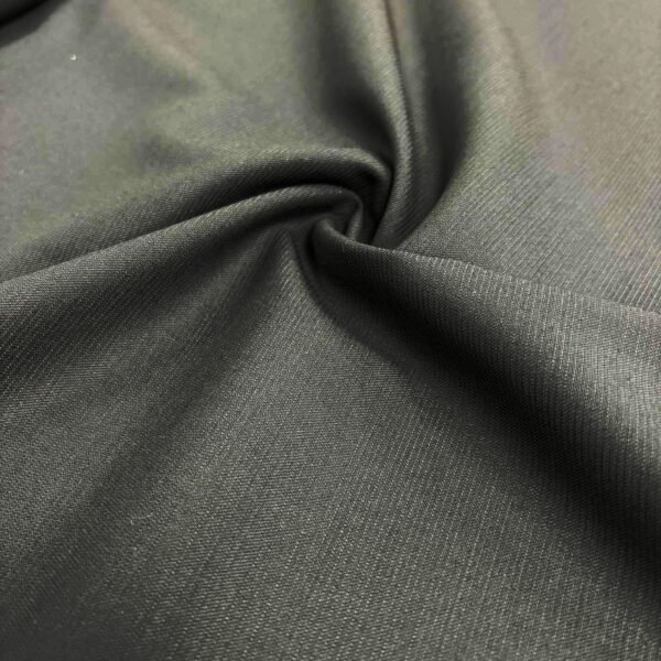 Kostiuminis audinys su vilna