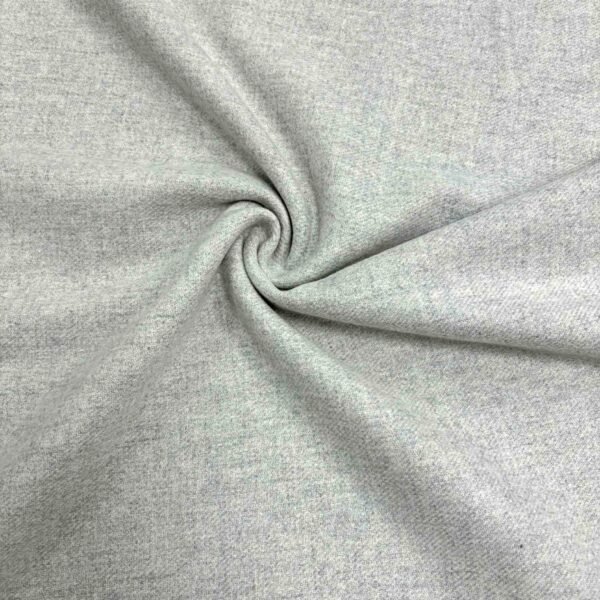 Šviesiai pilkos spalvos audinys iš vilnos