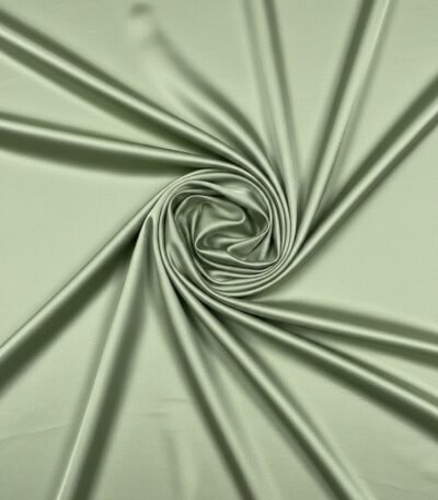 Blizgus dvipusis atlasas audinys šviesiai žalios spalvos