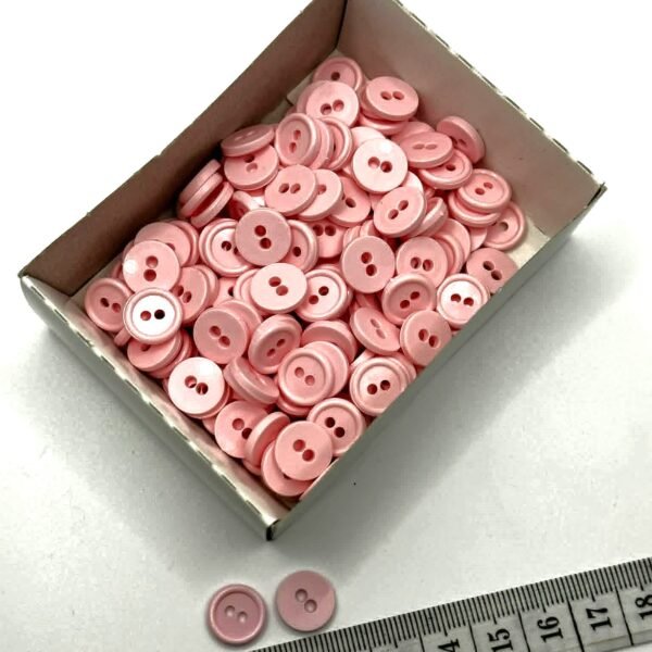 Plastikinė saga 12 mm su dviem skylutėmis švelni rožinė