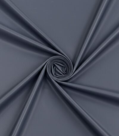 Tamsiai mėlyna dirbtinė oda su smulkia tekstūra, matinis paviršius