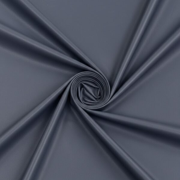 Tamsiai mėlyna dirbtinė oda su smulkia tekstūra, matinis paviršius