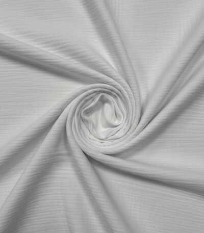 Baltas medvilninis muslino audinys su natūralia tekstūra