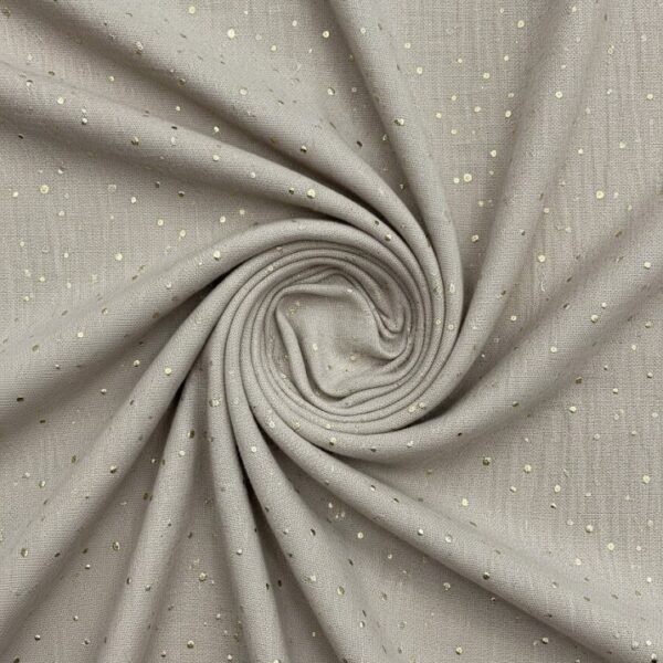 Medvilninis audinys su smulkiais taškeliais iš arti