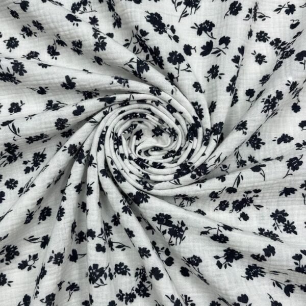 Medvilninis muslinas su smulkiu tamsių gėlyčių raštu