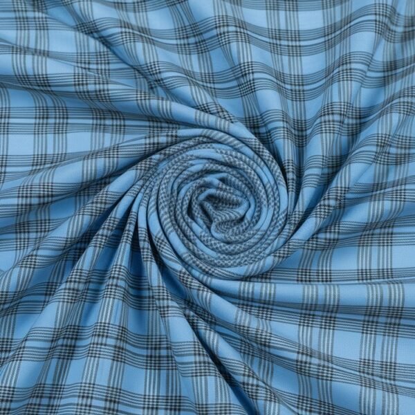 Šviesiai mėlynas viskozės pamušalas su languotu raštu 140 cm pločio