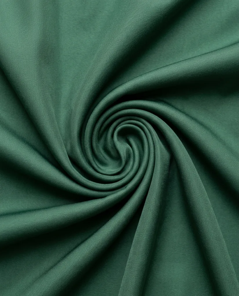 Žalias pamušalo audinys, spiralė, drabužių pamušalui